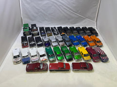 # 00342 - One Badd Ride + Muscle Machines Custom Truck Lot - 36 Pcs.