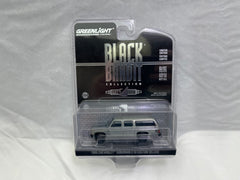 # 01269 - 1:64 Greenlight Black Bandit Series 29 1985 Suburban Chase - 1 Pc.